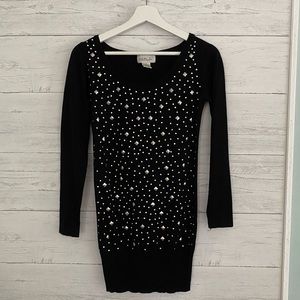 Fun and sassy black sweater!